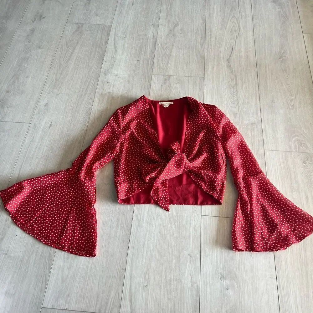 Urban outfitters women’s stars top size m